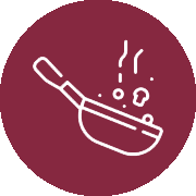 White line drawing of a frying pan with steam and bubbles on maroon circle background.