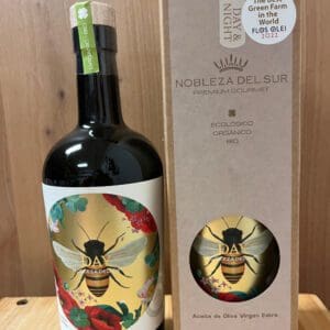 A bottle of honey wine with a bee-themed label and matching box.
